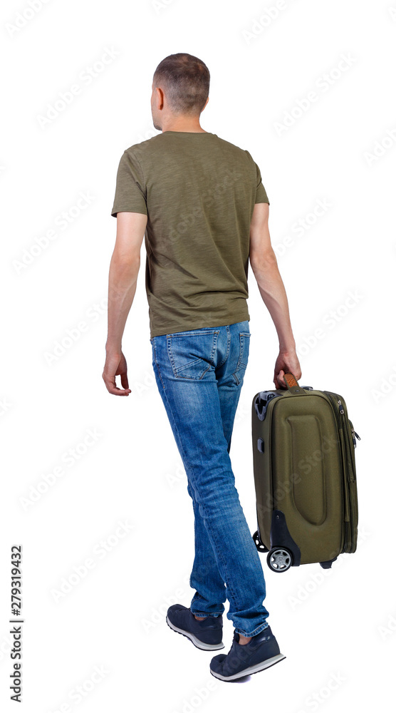 back view of walking  man  with suitcase.