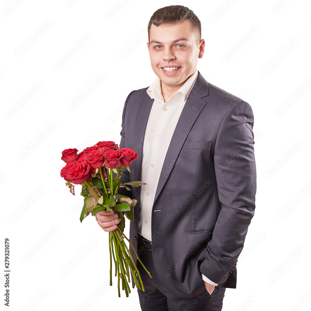 young attractive man with red roses on a beige background on Valentine's Day February 14 young attractive man with red roses on a beige background on Valentine's Day February 14