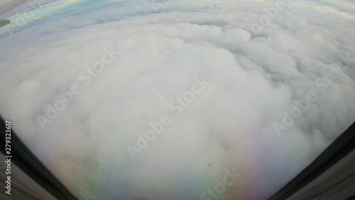 Porthole Window View. Plane Makes ATurn. photo