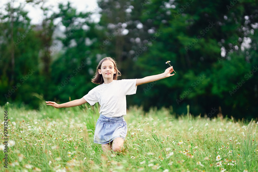 girl jumping on green grass girl jumping on green grass
