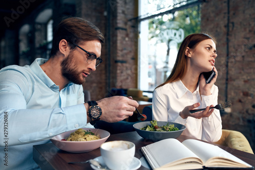 young couple having dinner in restaurant