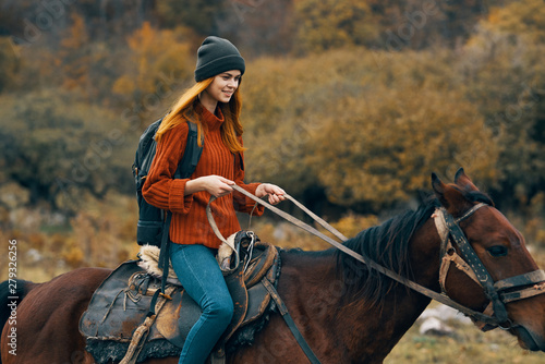 woman riding on horse