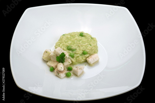 Canvas-taulu Italian food recipes, risotto with tench and peas.