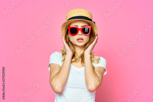 woman in a hat with glasses fashion