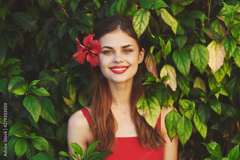 beautiful woman with flower in tropics head beautiful woman with flower in tropics head