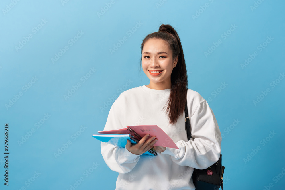 College Student girl. Isolated portrait of a beautiful young asian woman student. College Student girl. Isolated portrait of a beautiful young asian woman student.
