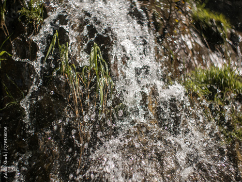 waterfall closeup with spray and rocks