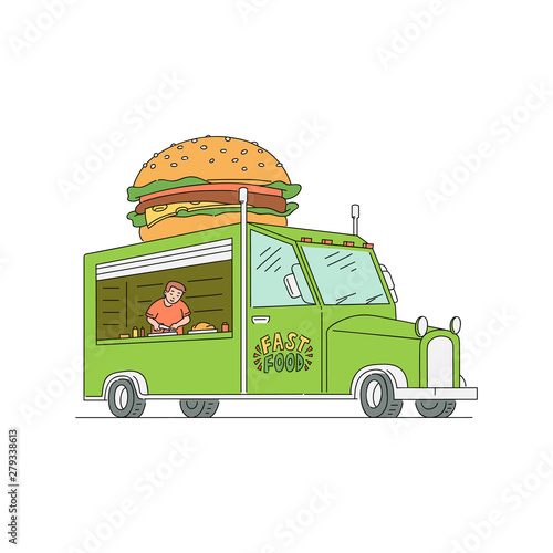 Street fast food burger truck with a worker man inside.