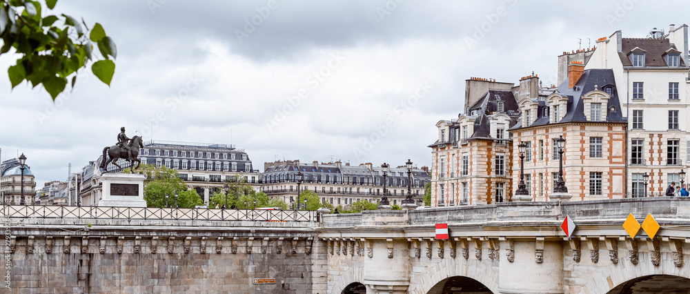 Architecture in France. The streets of the old center of Paris. Travel and tourism. River embankment . Banner
