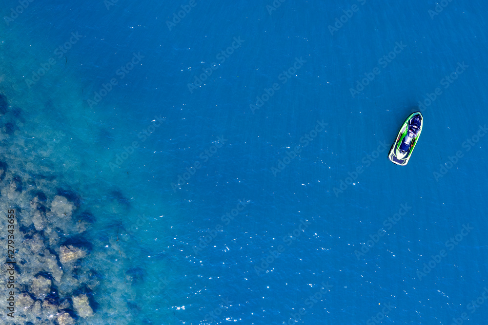 Fototapeta premium Aerial view of boats and ski jets in the sea. Boats and ski jets in the ocean. 