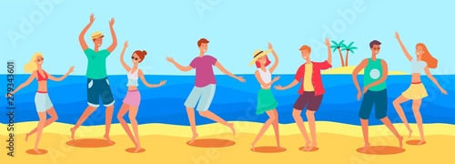 Tanned caucasian people, men and women dancing at a beach party by the sea on the sand.