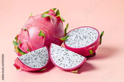 Fresh dragon fruit on pink.
