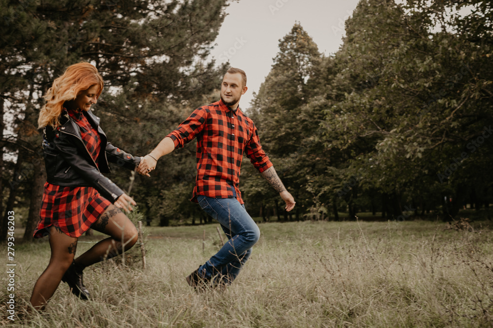 Fototapeta premium Happy loving couple outdoor in park .