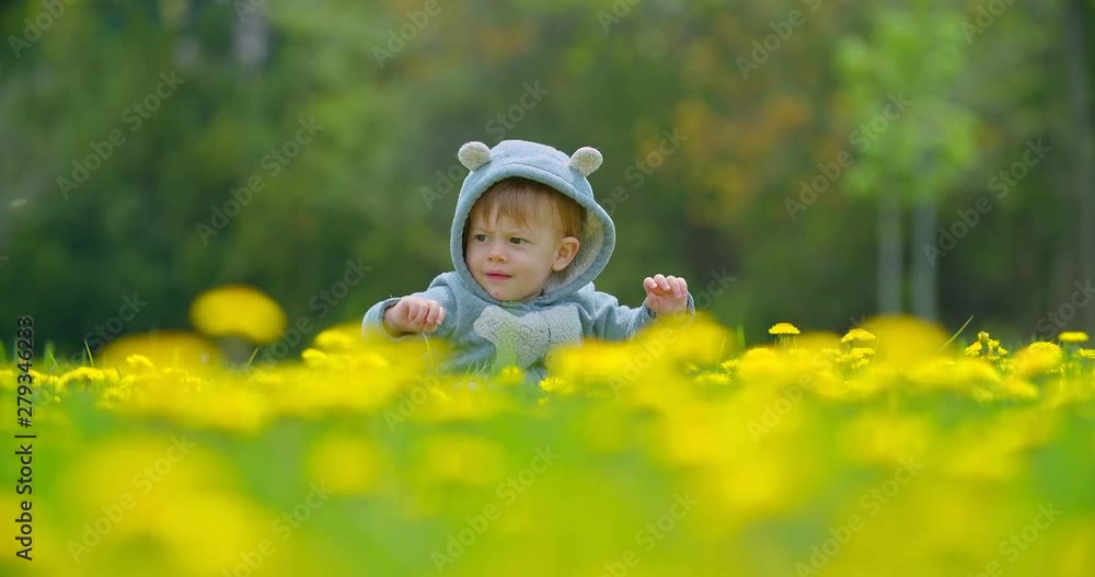 Little boy play in the park at summer time Little boy play in the park at summer time
