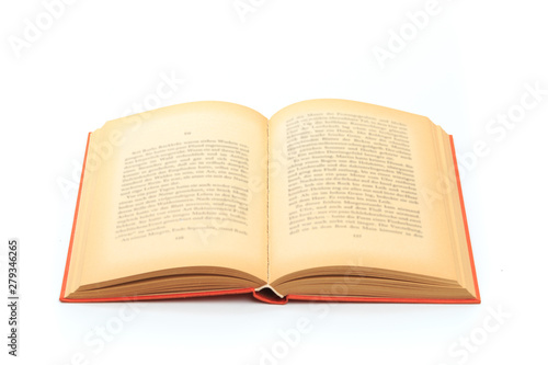 open vintage book isolated on a white background .