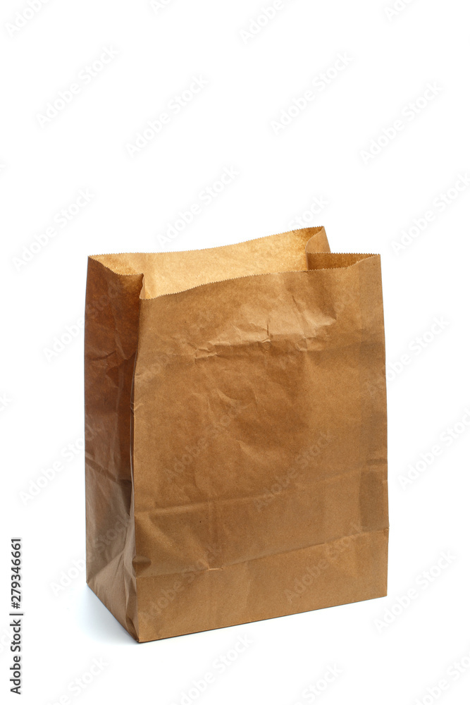 Paper bag on white background. Mockup for design . Paper bag on white background. Mockup for design .