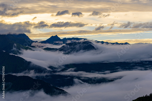 The clouds sea and sunrise in the mountains in West Sichuan, China. © imphilip
