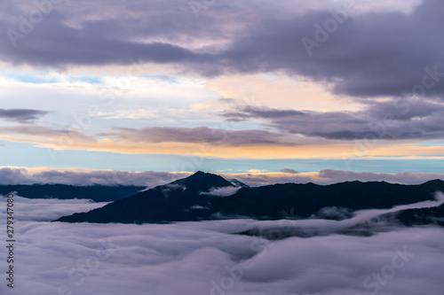 The clouds sea and sunrise in the mountains in West Sichuan, China. © imphilip