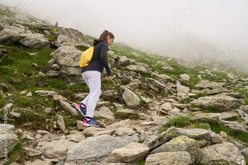 Woman hiker with backpack