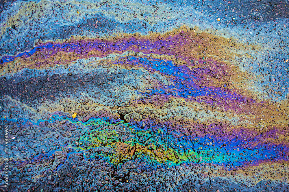 Spilt Oil Petrol Pollution Leak Rainbow Leak on a Road