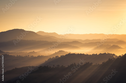 Mountain View with Morning Sunlight in the Mist © patpitchaya