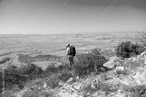 backpacker traveler with hat and white shirt © robcartorres