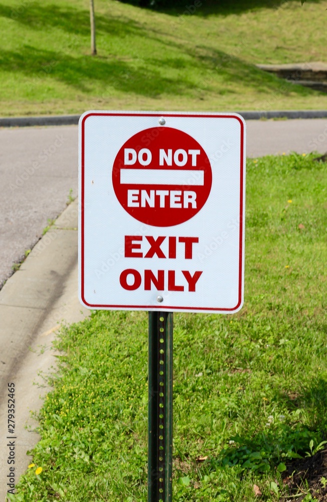 A close view of the do not enter exit only sign.