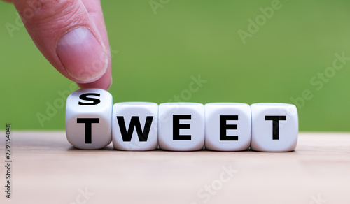 Hand turns a dice and changes the word "sweet" to "tweet".