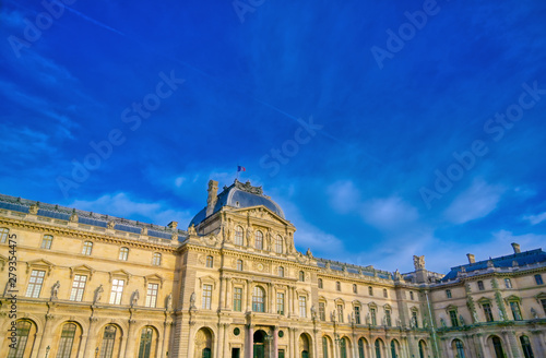 Paris, France - April 21, 2019 - A view of the Louvre Museum, the world's largest art museum and a historic monument in Paris, France, on a sunny day.