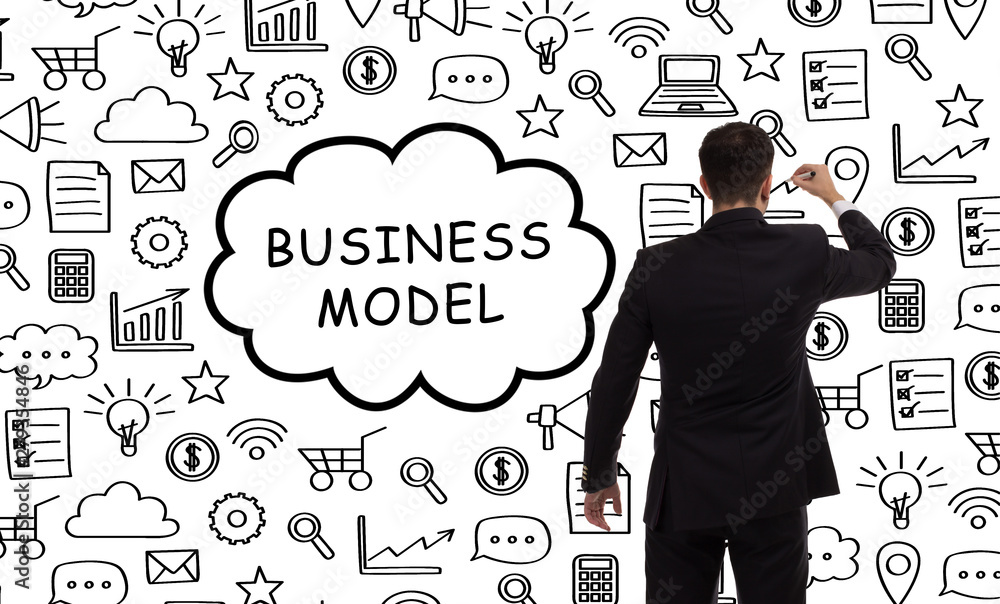 Business, technology, internet and networking concept. Young entrepreneur showing keyword: Business model