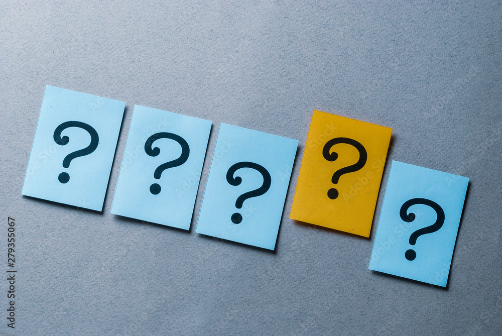 Four question marks on blue and one on yellow Four question marks on blue and one on yellow