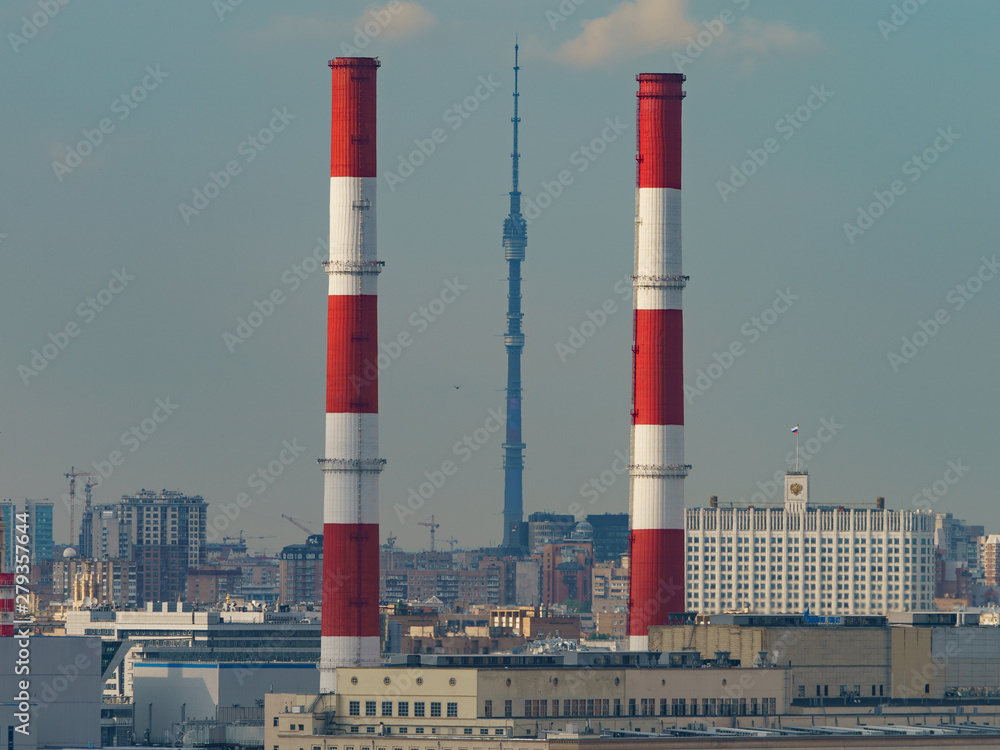 Obraz premium View from above of Moscow city. Heat station pipes, House of the Government of the Russian Federation (Russian White House), high spire of Ostankino tv tower in summer 
