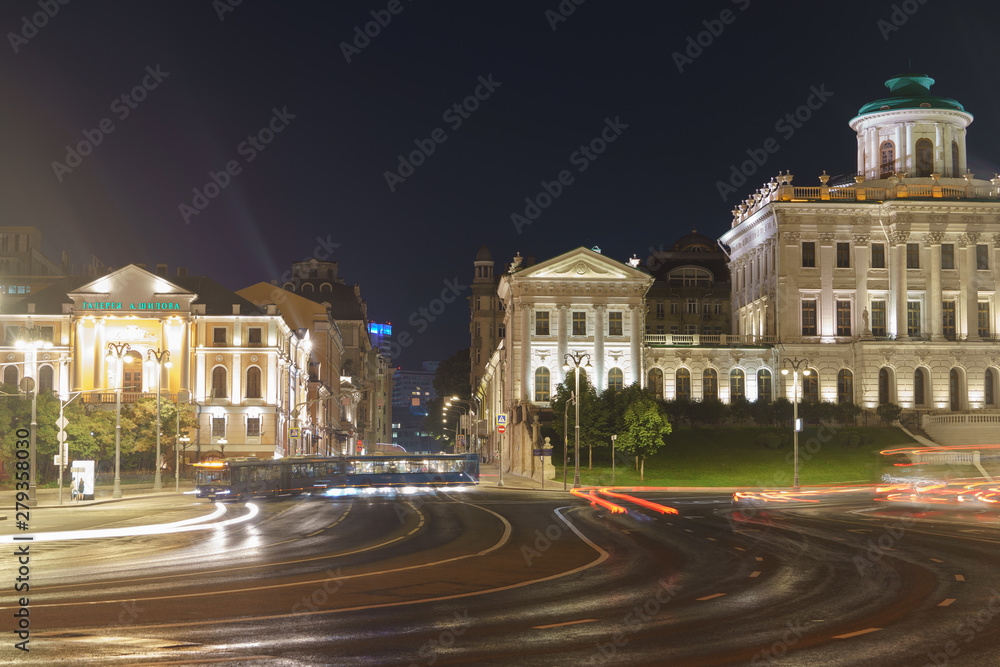 Long exposure image of Moscow downtown in summer night. Gallery A. Shilov, Pashkov House across the road with blurred motion. Translation of words 