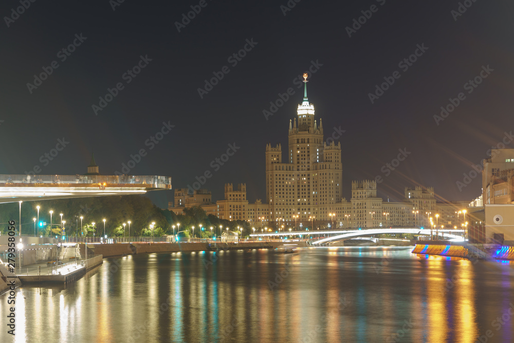 Long exposure image of the observation deck in Zaryadye Park near the Moscow Kremlin. Kotelnicheskaya Embankment Building built in the Stalinist neoclassical style in distance. High resolution image.
