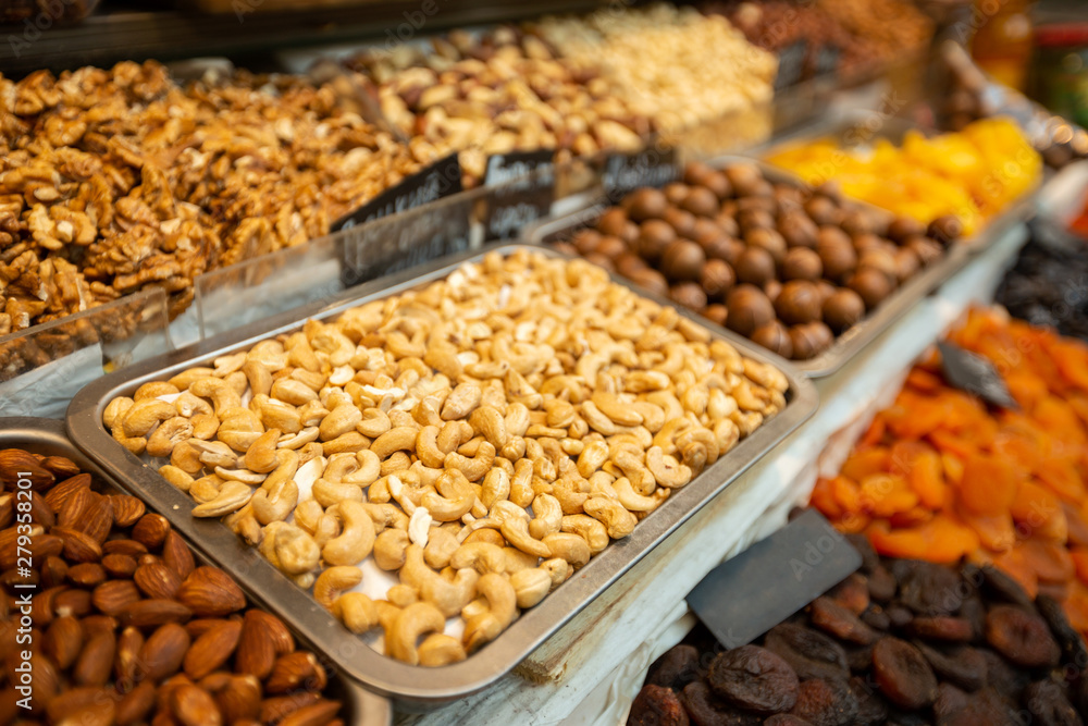 A lot of cashew in box on sale at farms market