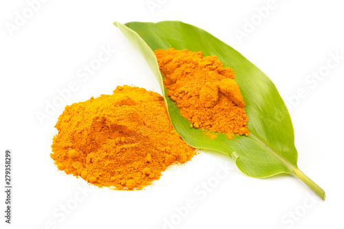 Turmeric powder (Curcuma) on white background. herbal photo