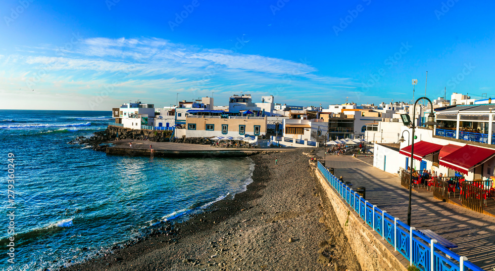 Atmospheric traditional village El Cotillo with great beach. Fuerteventura island. Canary islands of Spain