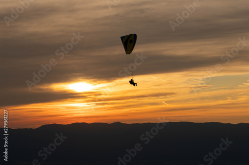 Sunset and paraglider