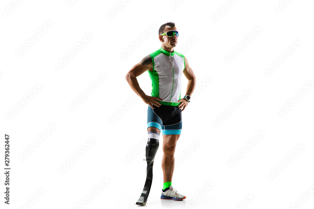 Athlete with disabilities or amputee isolated on white studio background. Professional male runner with leg prosthesis training and practicing in studio. Disabled sport and healthy lifestyle concept. Athlete with disabilities or amputee isolated on white studio background. Professional male runner with leg prosthesis training and practicing in studio. Disabled sport and healthy lifestyle concept.
