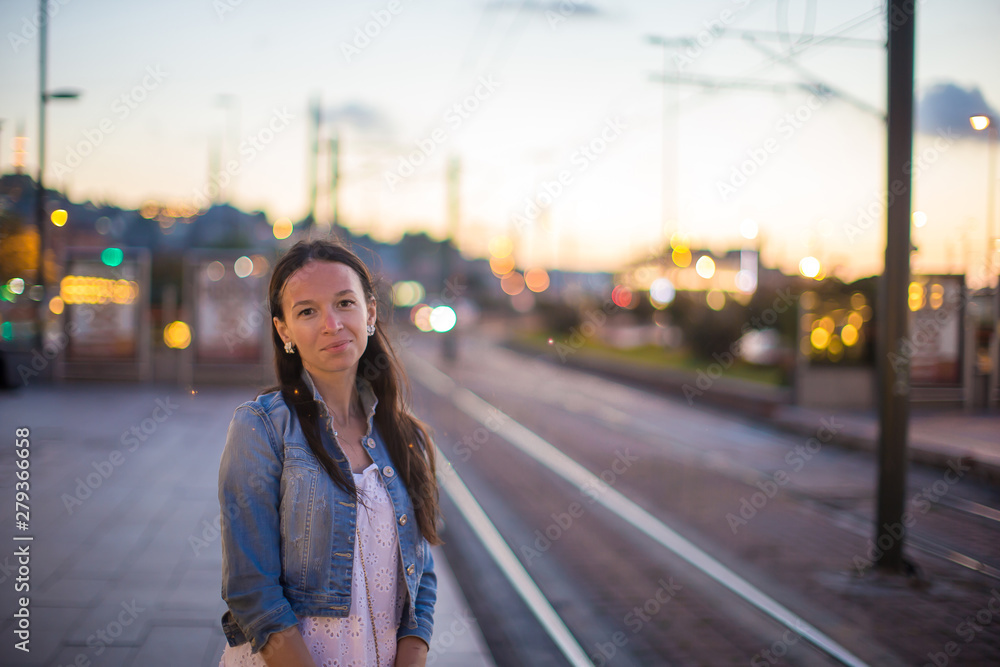 Young beautiful woman talking on her phone Young beautiful woman talking on her phone