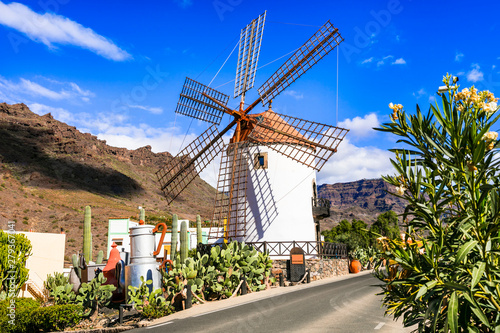 Traditional village Mogan with old windmill , Canary island. Gran Canaria travel photo