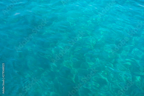 Blue sea water blurred ripple background. Aegean Sea, Turkey © axynia