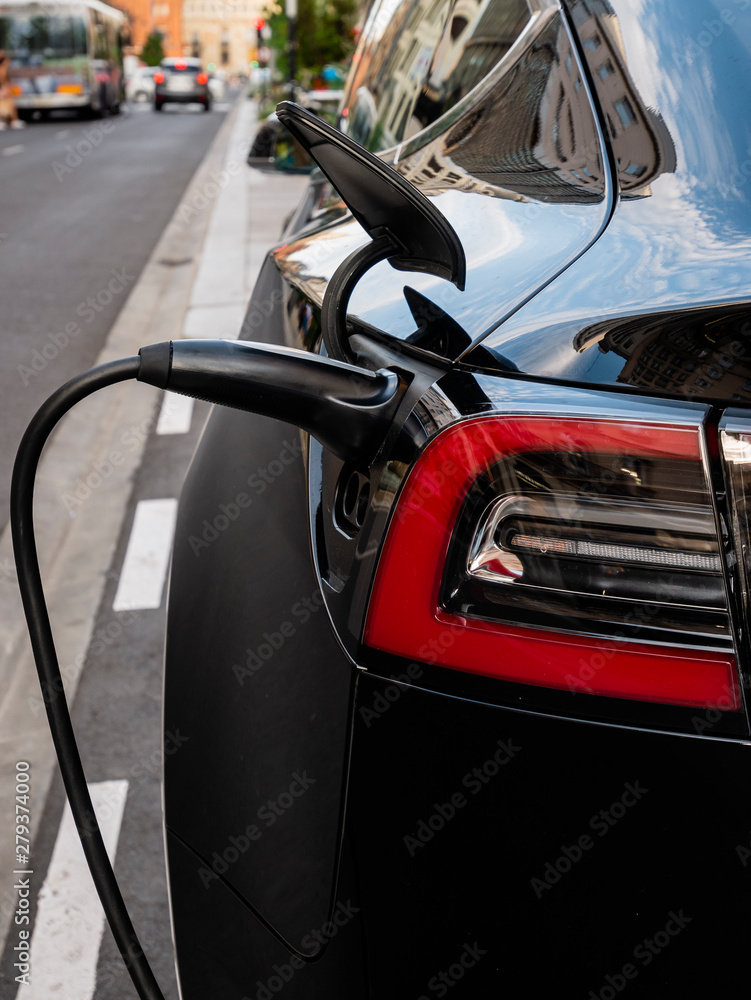 Fototapeta premium Recharge your electric vehicle here for free
