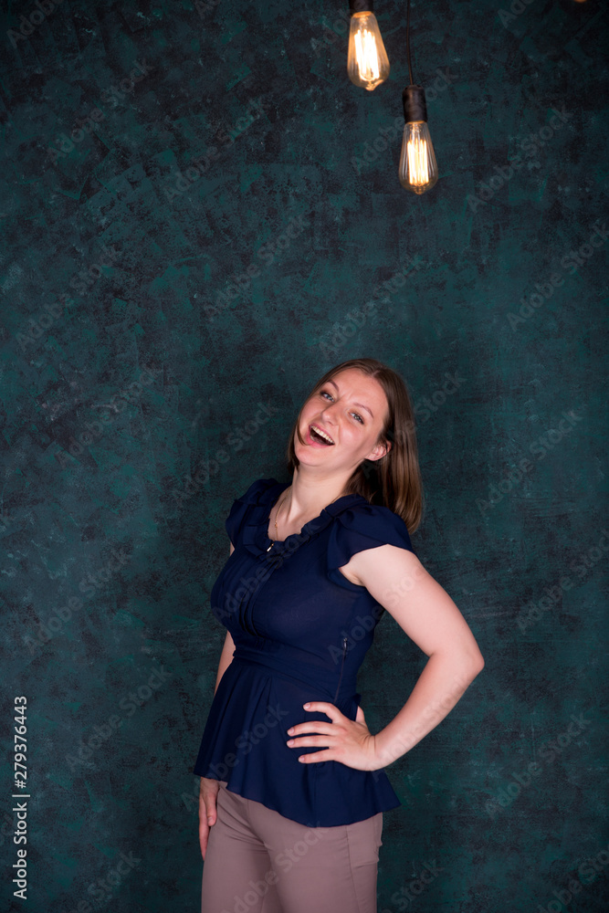 Fototapeta premium Portrait of Beautiful Young Woman in Studio