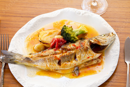 Baked fish with roasted vegetables