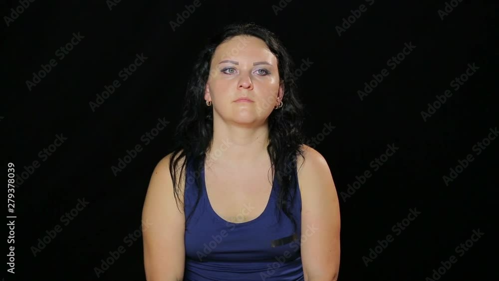 A young woman does exercises with eyes in the form of a rhombus A young woman does exercises with eyes in the form of a rhombus