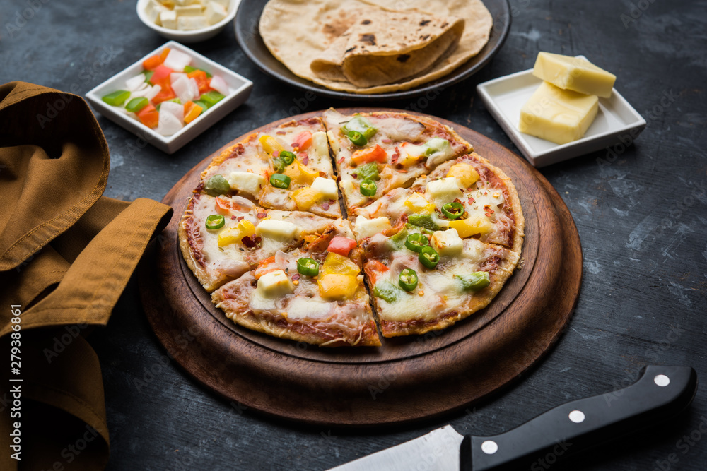 Chapati Pizza made using leftover Roti / Paratha with Cheese, vegetables, paneer and Sausage Chapati Pizza made using leftover Roti / Paratha with Cheese, vegetables, paneer and Sausage