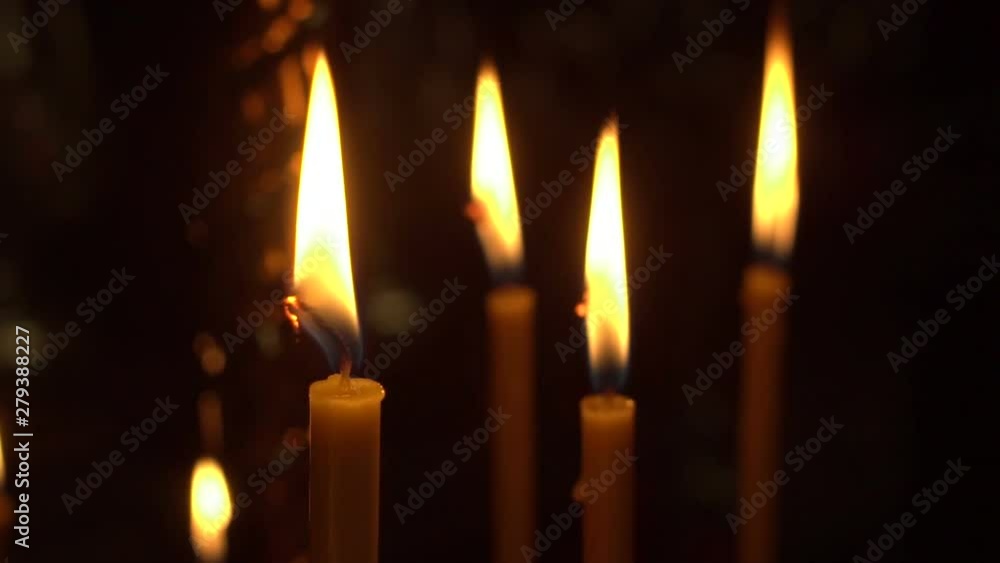 candles are lit close up candles are lit close up