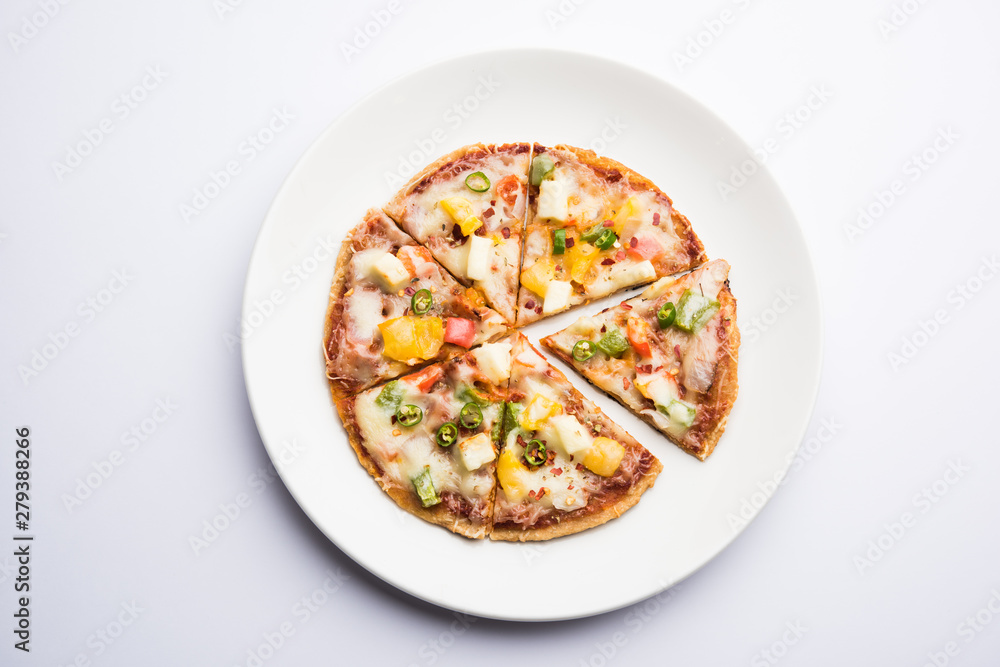 Chapati Pizza made using leftover Roti / Paratha with Cheese, vegetables, paneer and Sausage