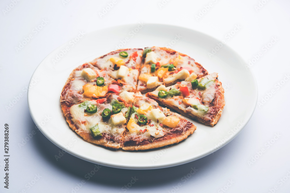 Chapati Pizza made using leftover Roti / Paratha with Cheese, vegetables, paneer and Sausage Chapati Pizza made using leftover Roti / Paratha with Cheese, vegetables, paneer and Sausage